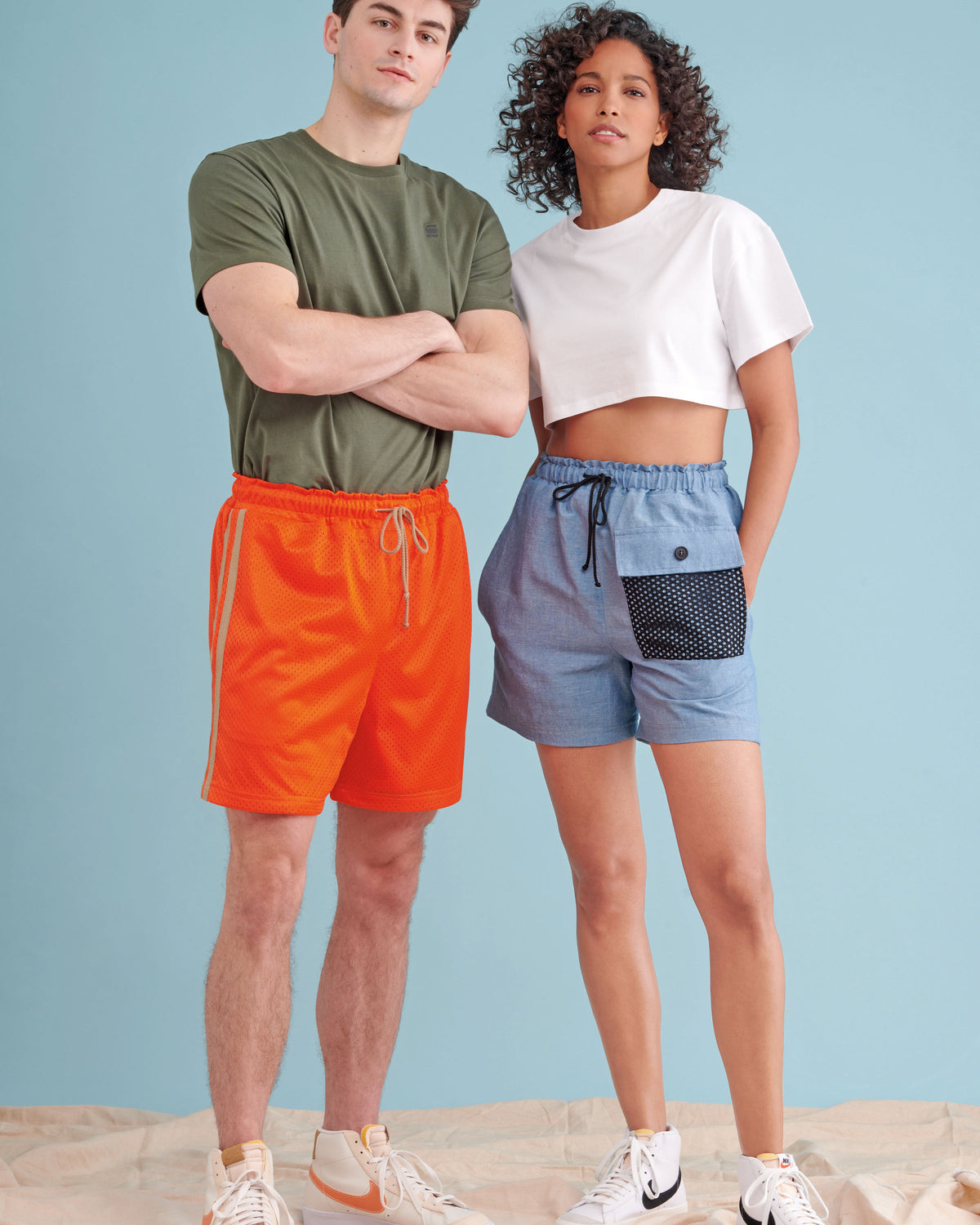 Simplicity sewing pattern S9795 envelope showing unisex pull-on shorts designs