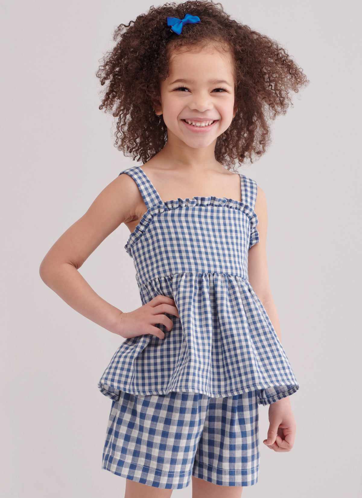 Simplicity sewing pattern S9800 envelope showing children's casual wear designs
