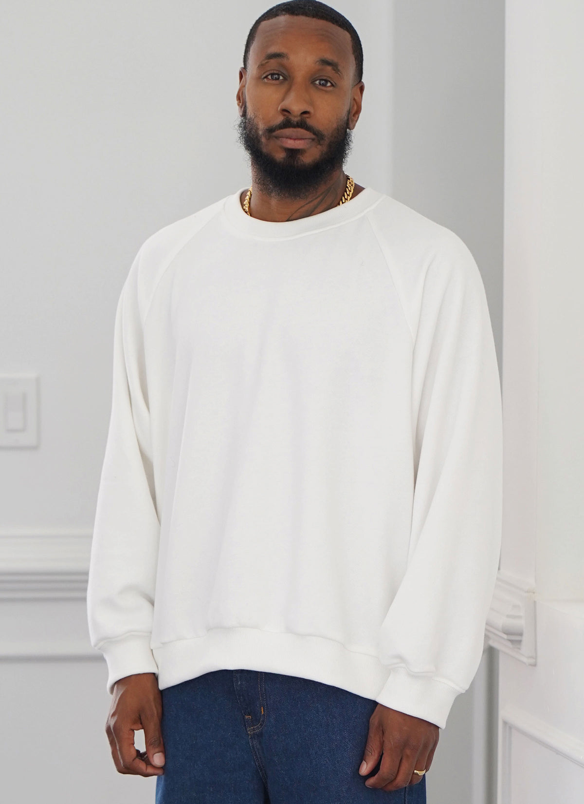 Simplicity sewing pattern S9897 envelope showing unisex sweatshirt top designs