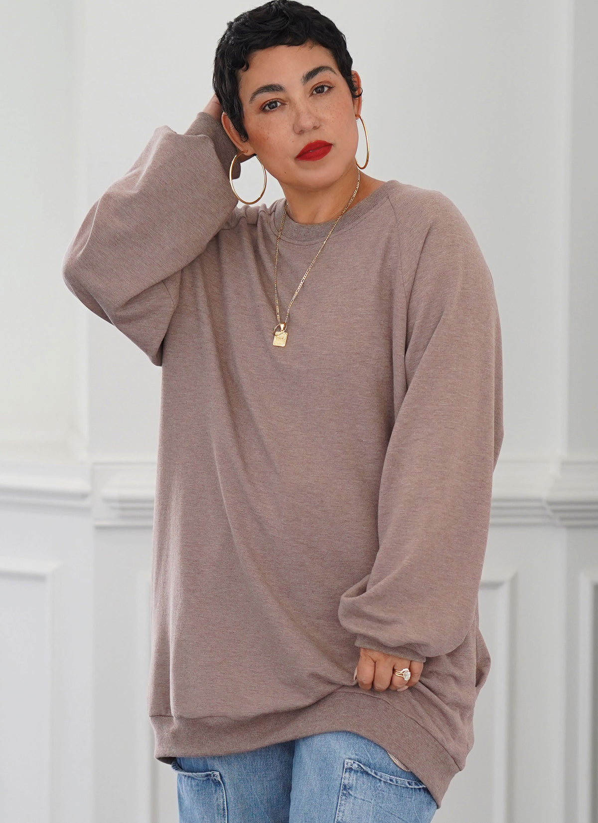 Simplicity sewing pattern S9897 envelope showing unisex sweatshirt top designs