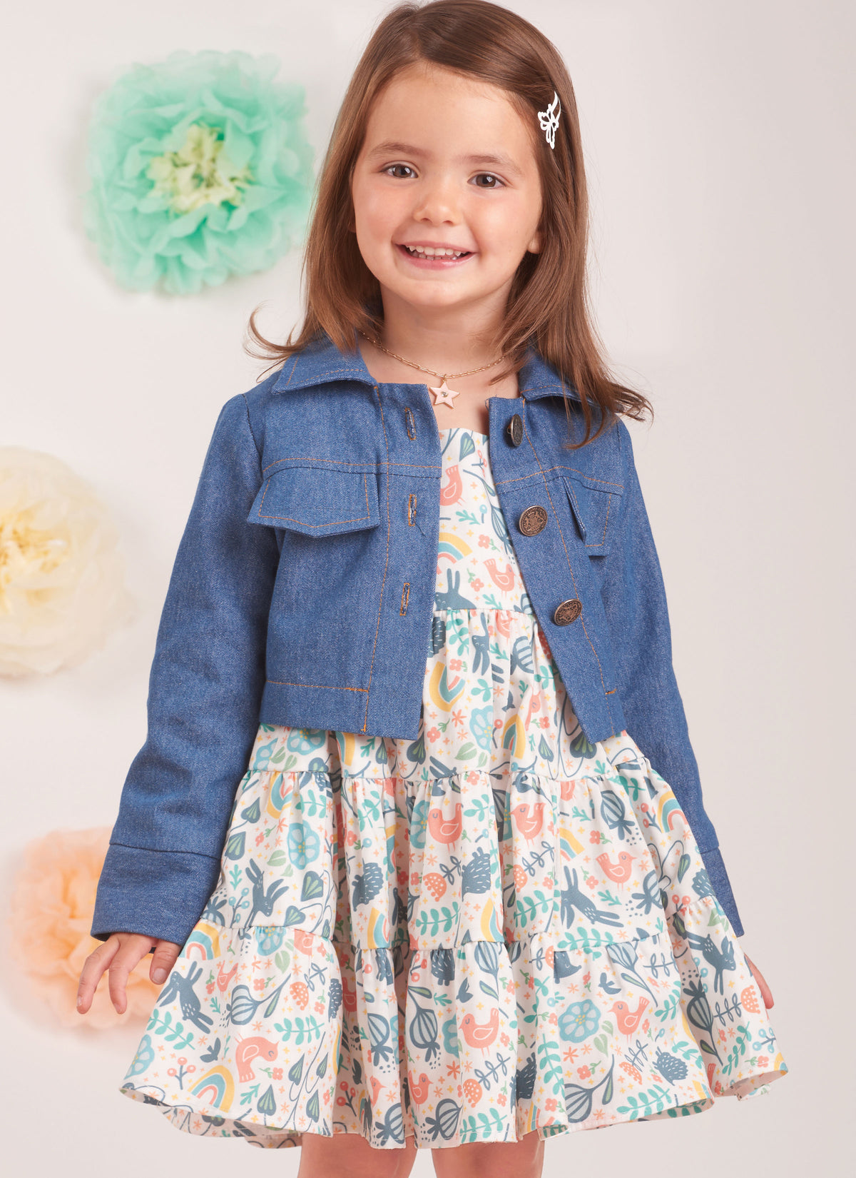 Simplicity sewing pattern S9899 envelope showing toddler jean jacket & dress designs