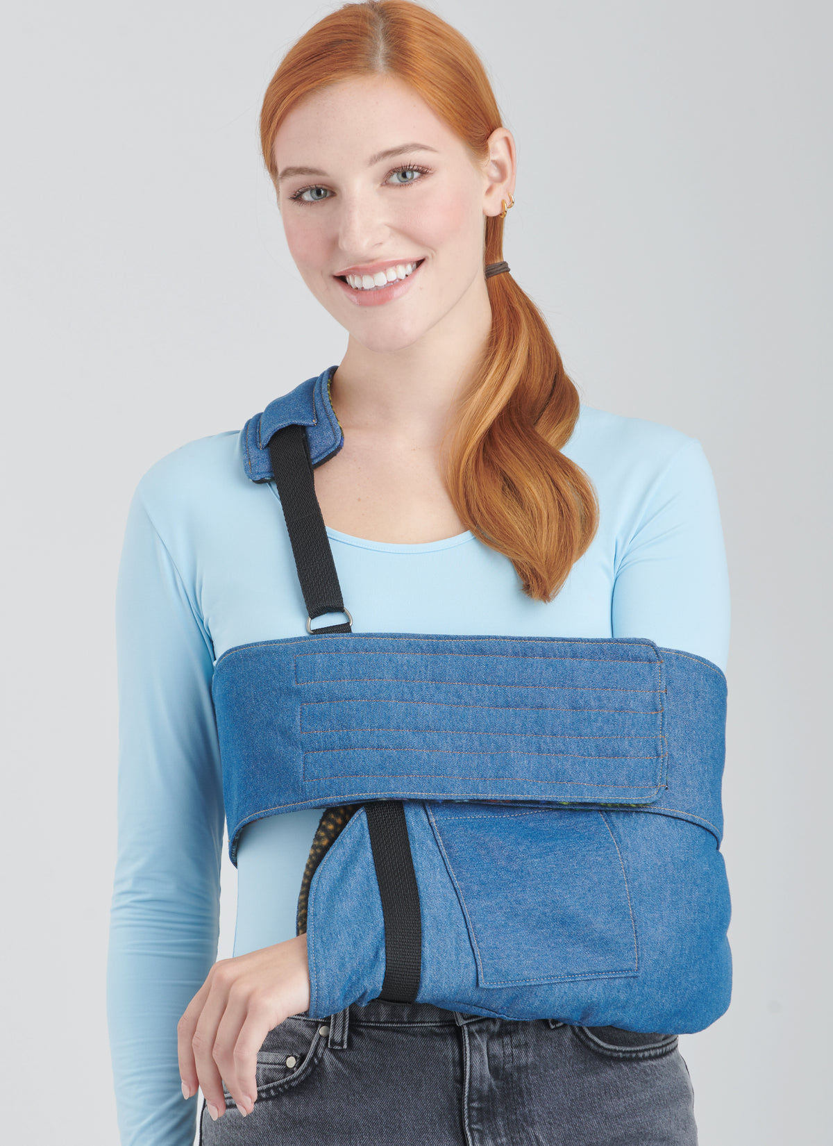 Simplicity sewing pattern S9902 envelope showing arm injury essentials designs