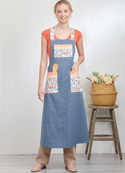 Simplicity S9938 sewing pattern envelope showing aprons