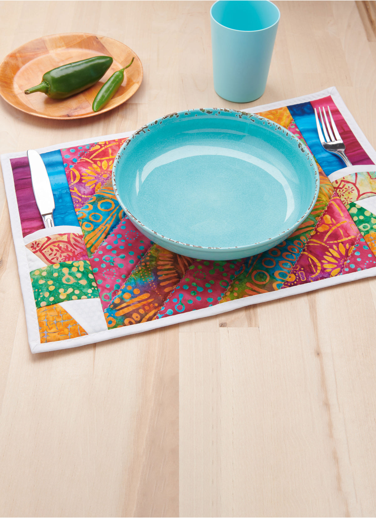 Simplicity S9942 sewing pattern envelope showing an apron and quilted kitchen accessories