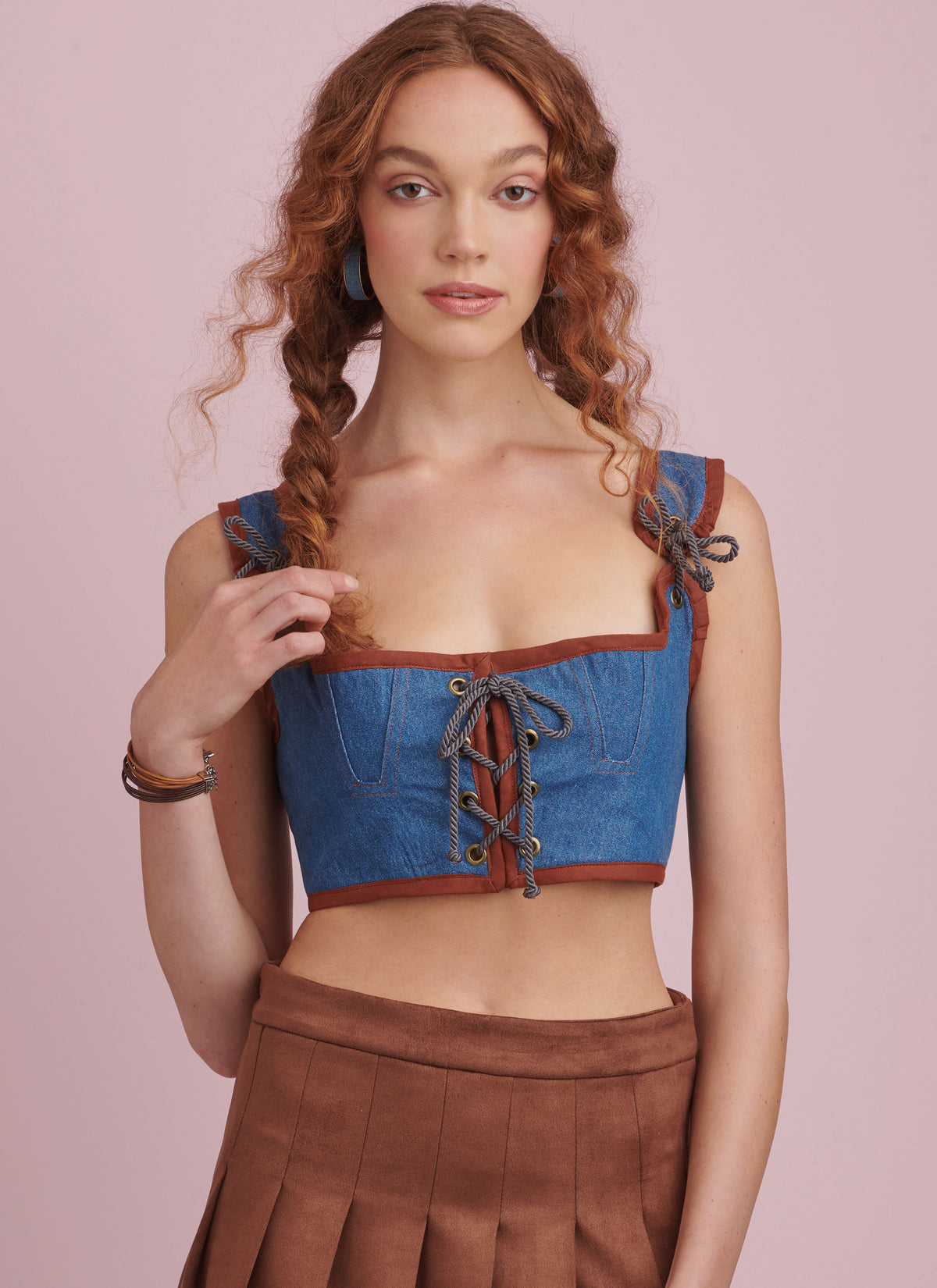 Simplicity S9943 sewing pattern envelope showing lace-up corset tops