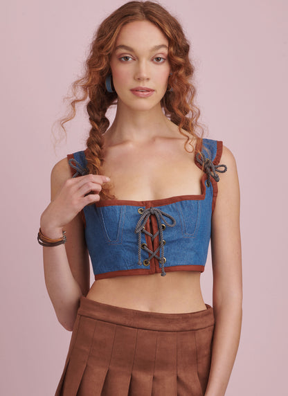 Simplicity S9943 sewing pattern envelope showing lace-up corset tops