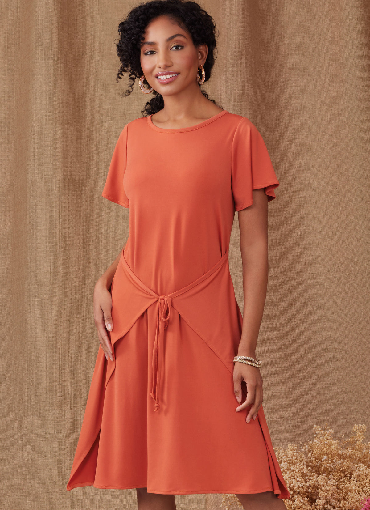 Simplicity S9947 sewing pattern envelope showing dresses