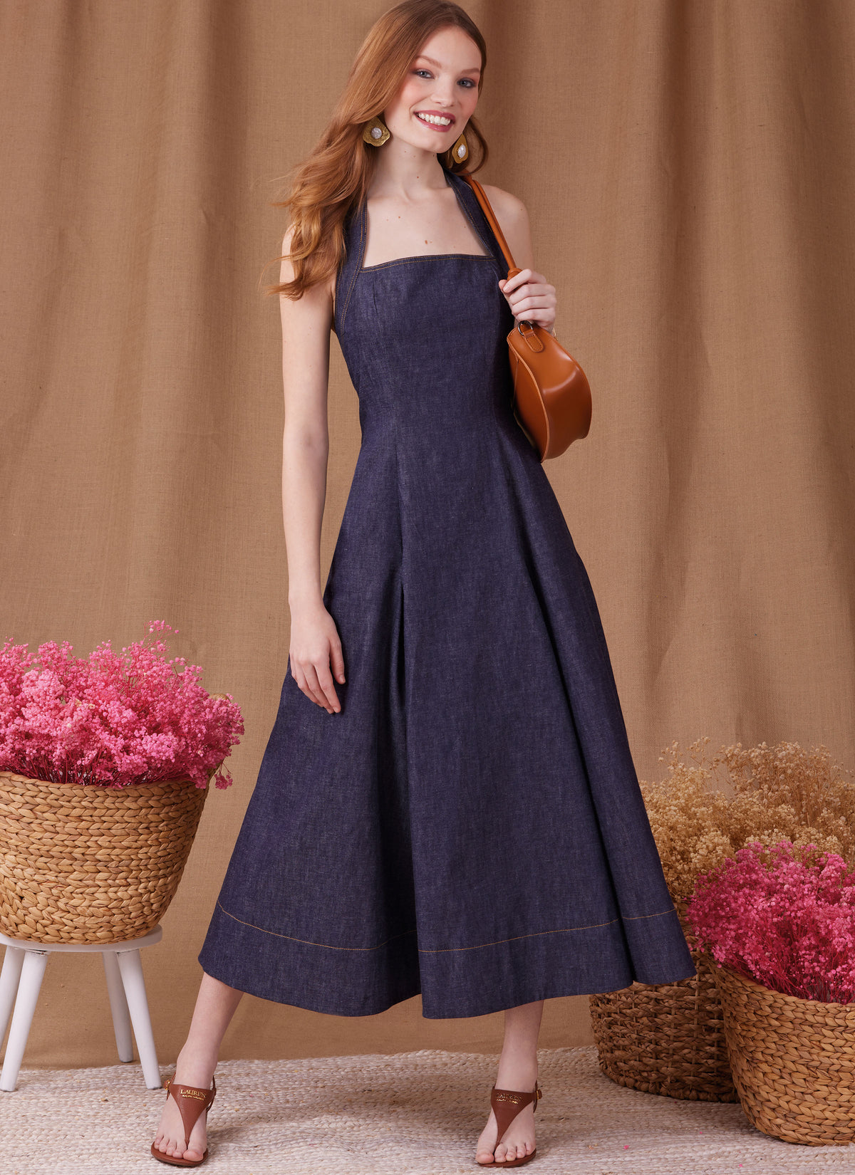 Simplicity S9949 sewing pattern envelope showing dresses