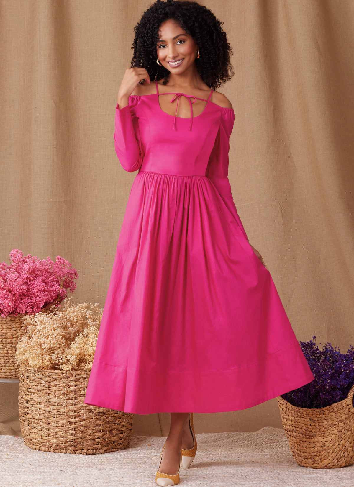 Simplicity S9950 sewing pattern envelope showing dresses