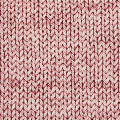 Skein of Symfonie Bella semi-solid merino yarn in Pink Sandstone