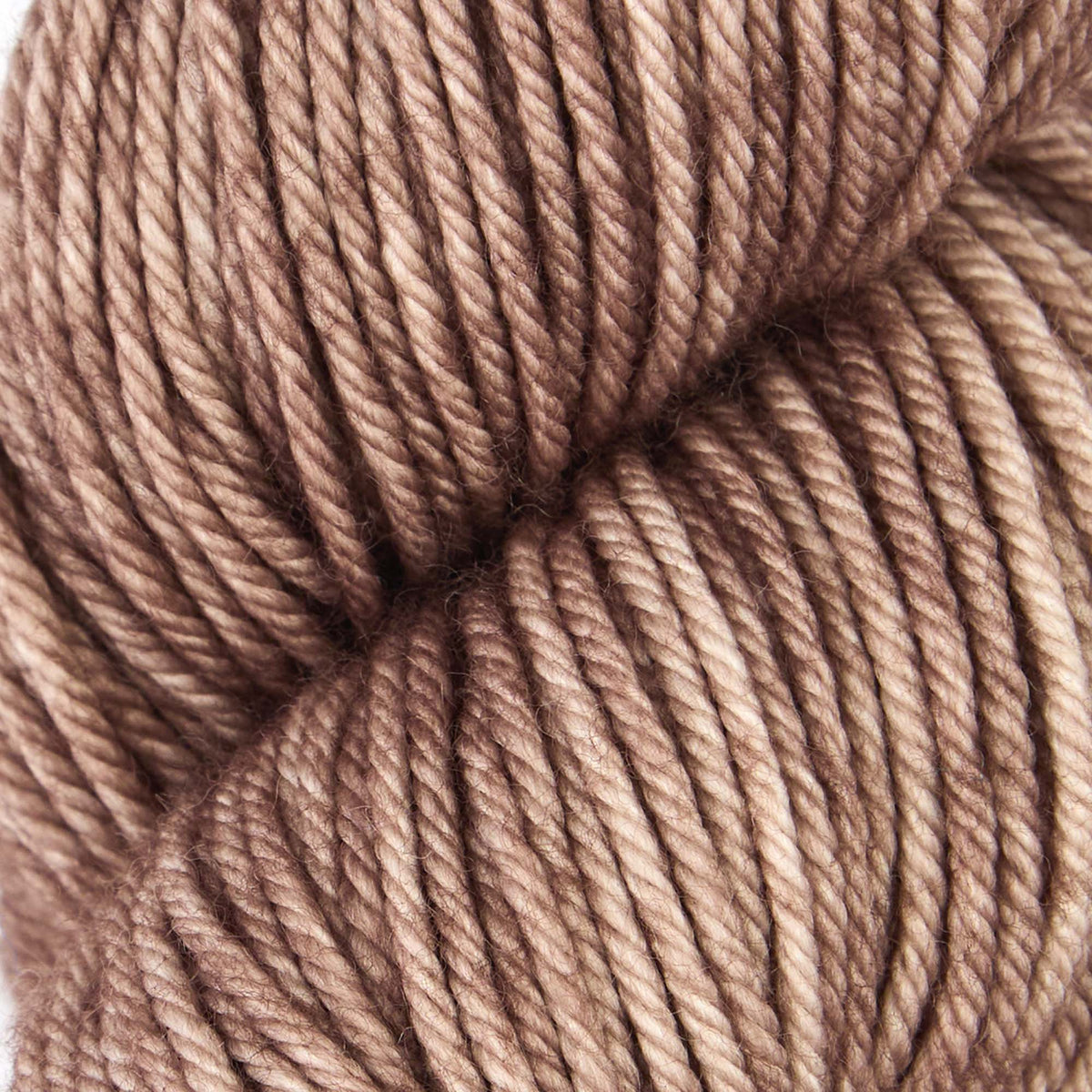 Skein of Symfonie Bella semi-solid merino yarn in Wood Ash