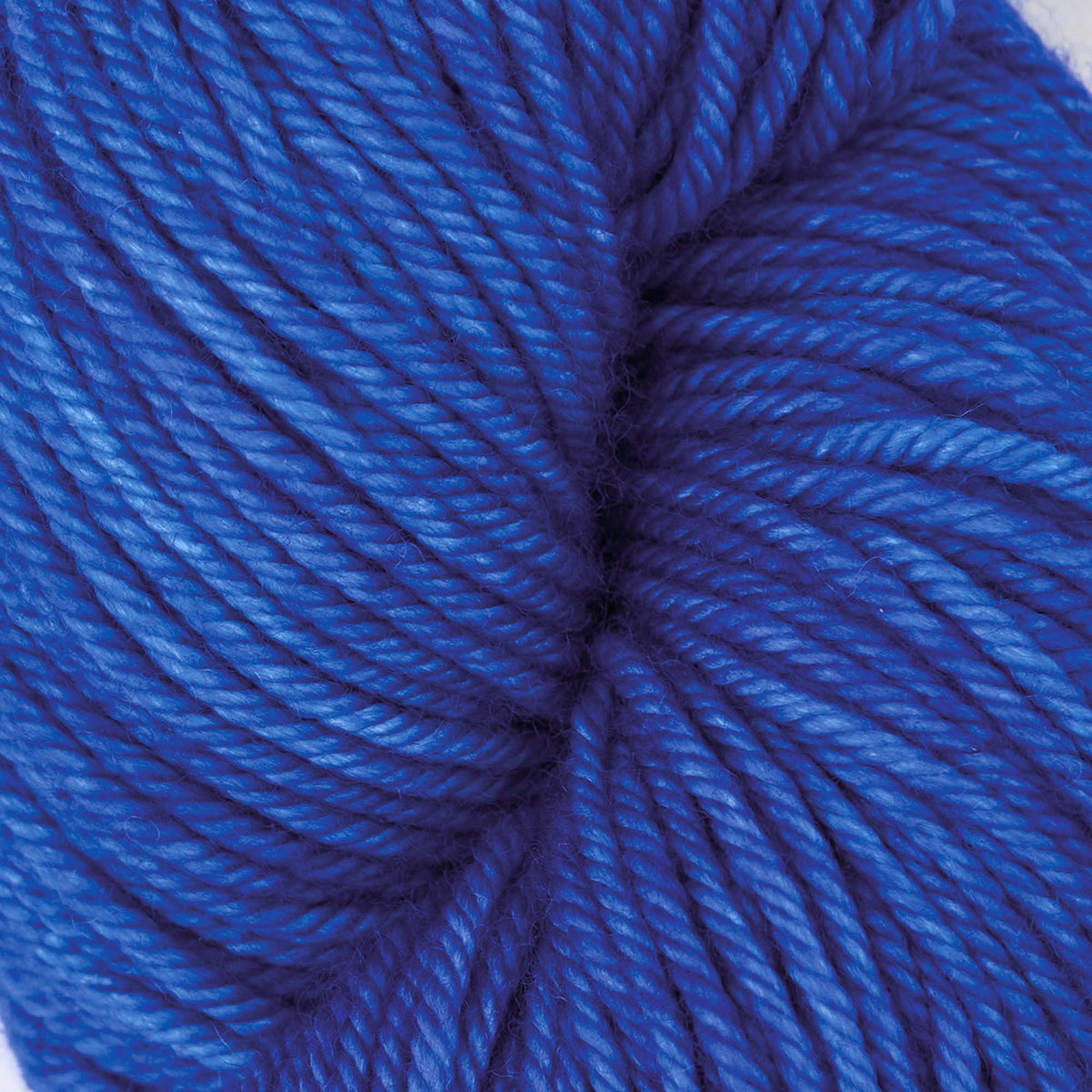 Skein of cobalt blue Bella merino worsted yarn