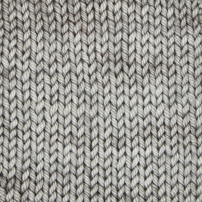Skein of Symfonie Bella semi-solid merino yarn in Mirror