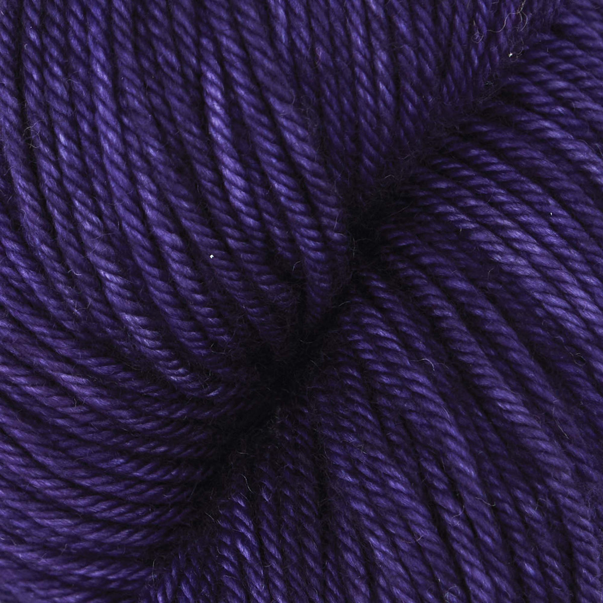 Skein of aubergine Bella merino worsted yarn