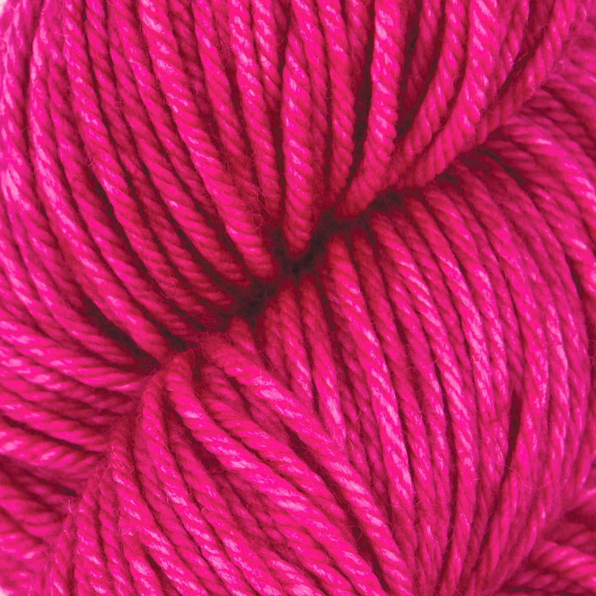 Skein of Symfonie Bella semi-solid merino yarn in Wedding Pink