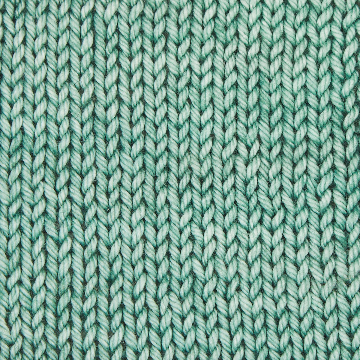 Skein of Symfonie Bella semi-solid merino yarn in Sage