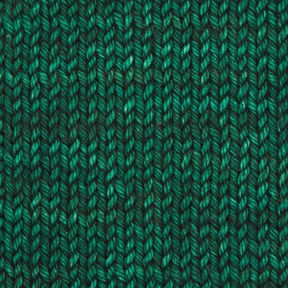 Skein of deep emerald Bella merino worsted yarn