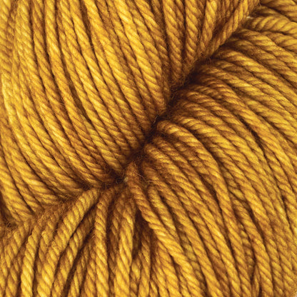 Skein of Symfonie Bella semi-solid merino yarn in Spicy Mustard
