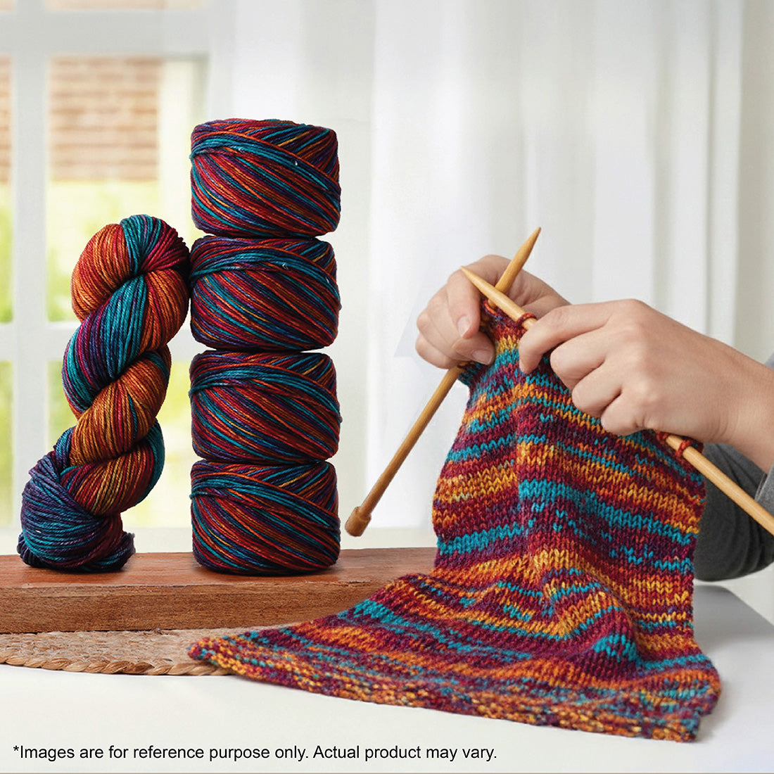 Hand-dyed skein of Symfonie Bella yarn in Party Lights