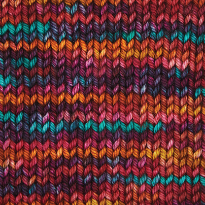 Hand-dyed skein of Symfonie Bella yarn in Party Lights