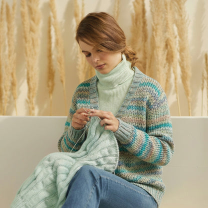 Hand-dyed skein of Symfonie Bella yarn in Sandy Sea