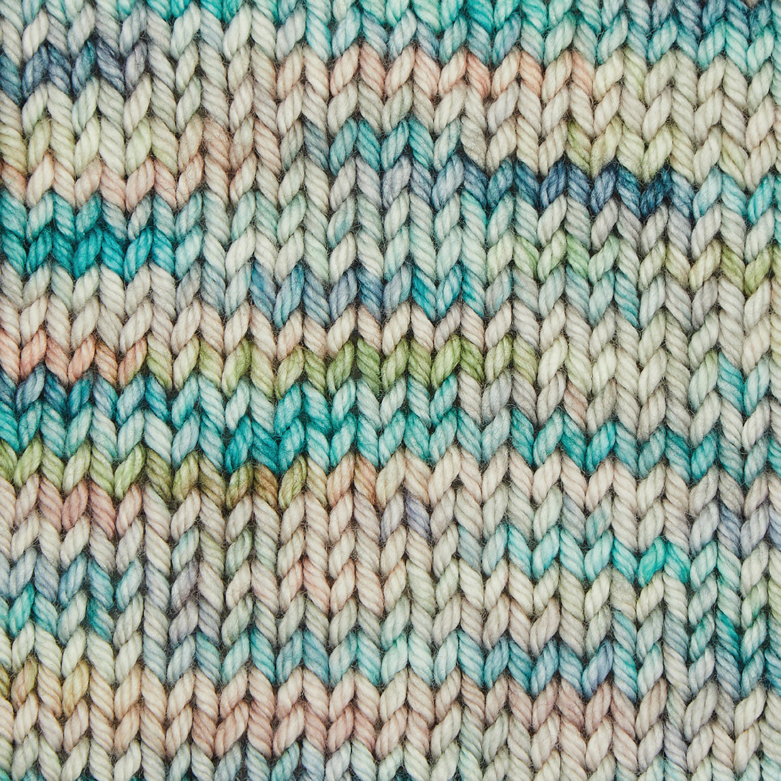Hand-dyed skein of Symfonie Bella yarn in Sandy Sea