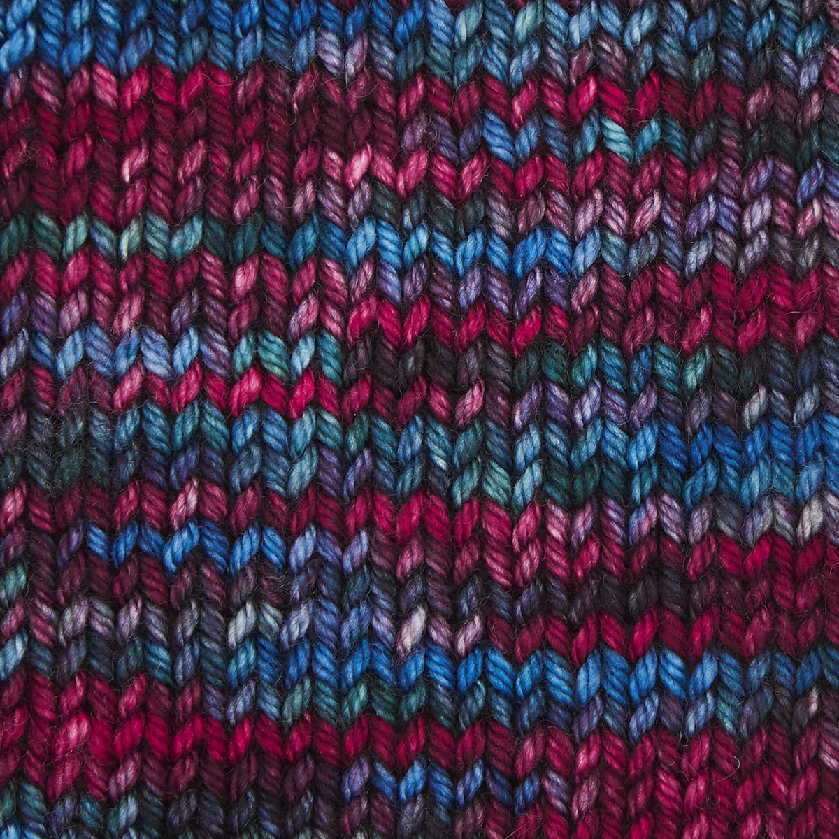 Hand-dyed skein of Symfonie Bella yarn in Twilight Flame