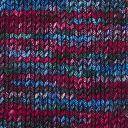 Hand-dyed skein of Symfonie Bella yarn in Twilight Flame