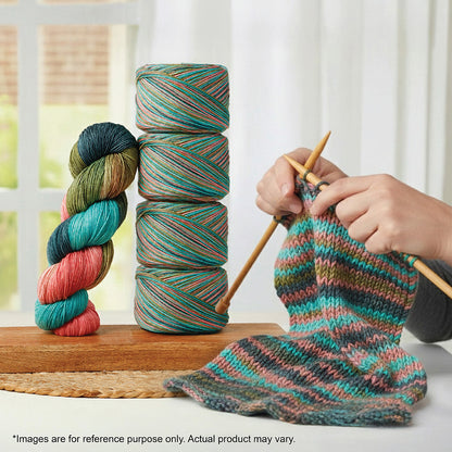Hand-dyed skein of Symfonie Bella yarn in Spring Blush
