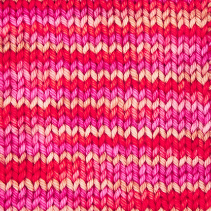 Hand-dyed skein of Symfonie Bella yarn in Rhubarb