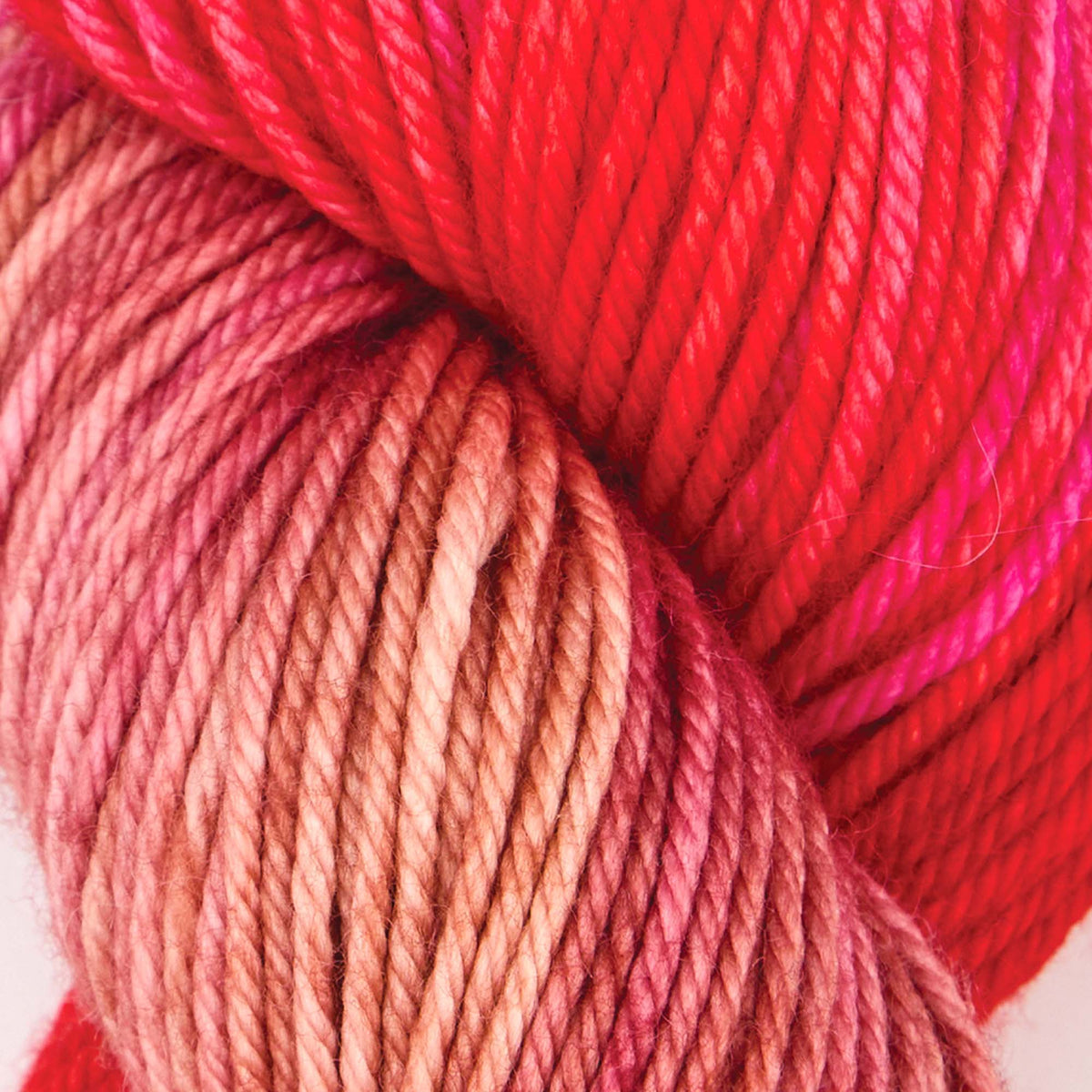 Hand-dyed skein of Symfonie Bella yarn in Rhubarb