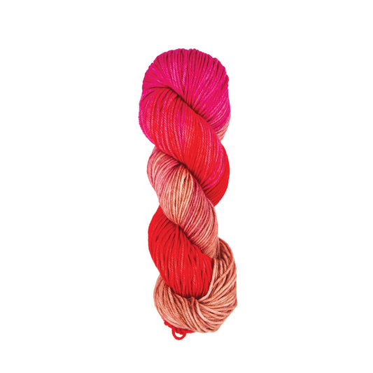 Hand-dyed skein of Symfonie Bella yarn in Rhubarb
