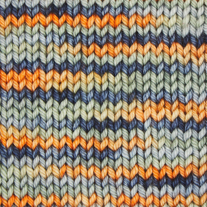 Hand-dyed skein of Symfonie Bella yarn in New York New York