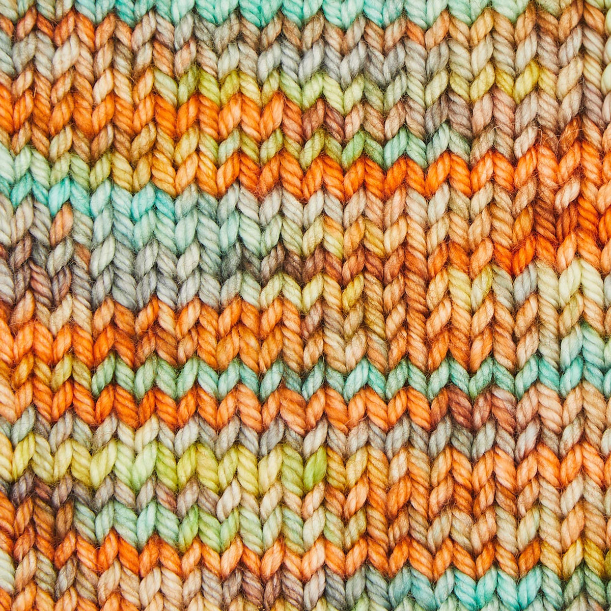 Skein of Symfonie Bella variegated merino yarn in Lagoon Dream