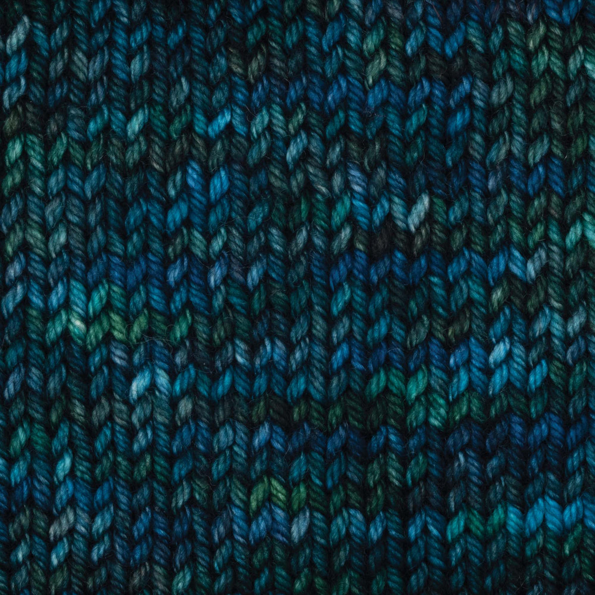 Hand-dyed skein of Symfonie Bella yarn in Tucson Teal