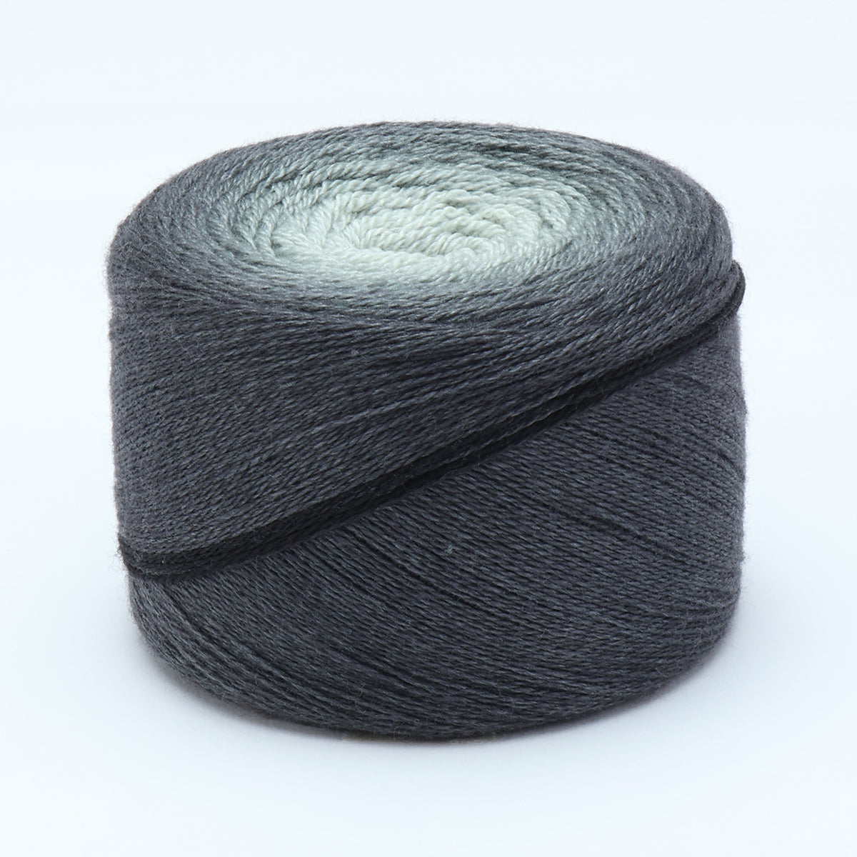 Hand-dyed cake of Symfonie Diva yarn in Nightfall