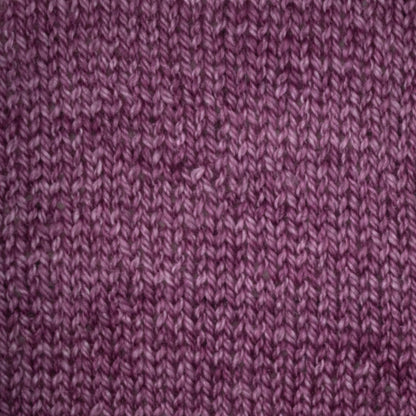 Hand-dyed cake of Symfonie Diva yarn in Amethyst Dust
