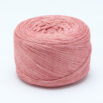 Hand-dyed cake of Symfonie Diva yarn in Rose Copper