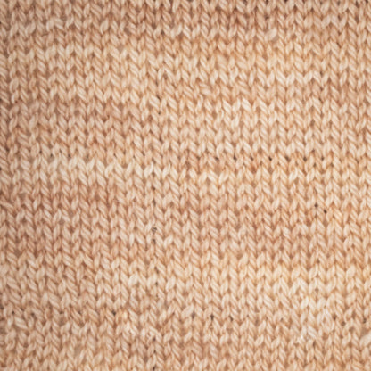 Hand-dyed cake of Symfonie Diva yarn in Champagne