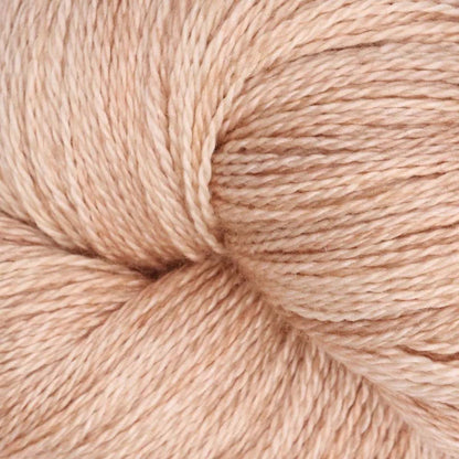 Hand-dyed cake of Symfonie Diva yarn in Champagne