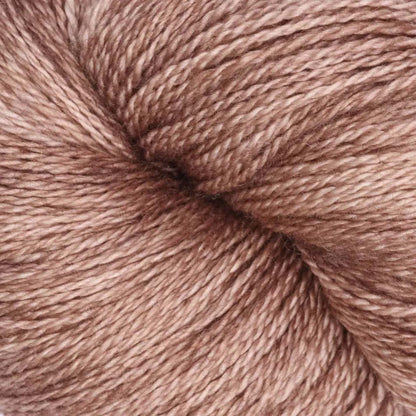 Hand-dyed cake of Symfonie Diva yarn in Bronze