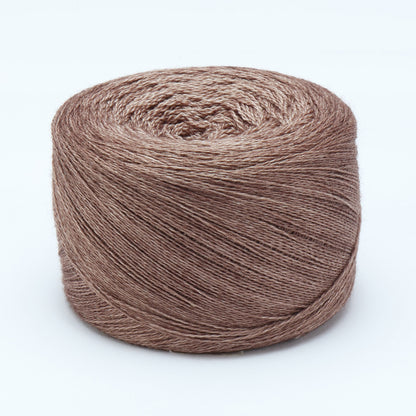 Hand-dyed cake of Symfonie Diva yarn in Bronze