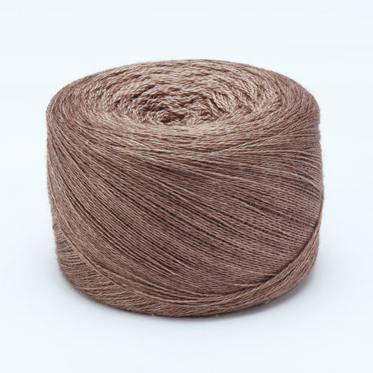 Hand-dyed cake of Symfonie Diva yarn in Bronze