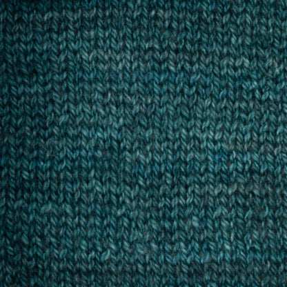Hand-dyed cake of Symfonie Diva yarn in Mermaid Teal