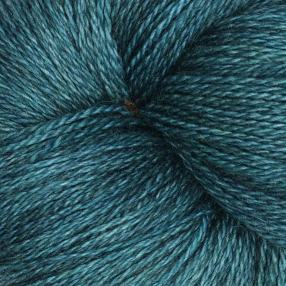 Hand-dyed cake of Symfonie Diva yarn in Mermaid Teal