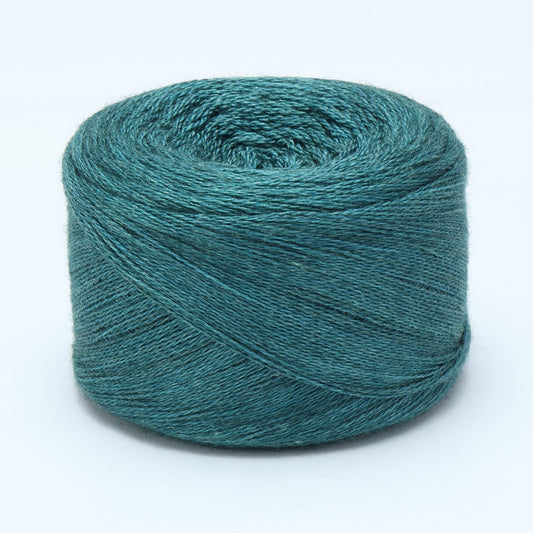 Hand-dyed cake of Symfonie Diva yarn in Mermaid Teal