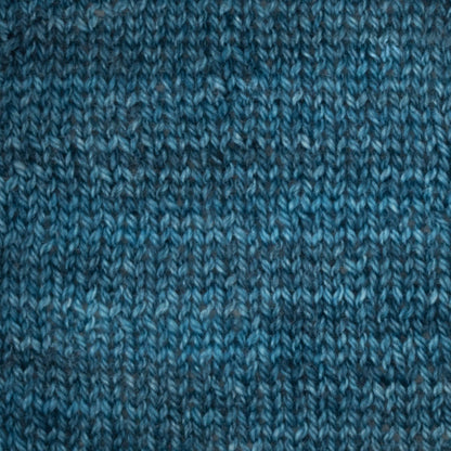 Hand-dyed cake of Symfonie Diva yarn in Sapphire Noir