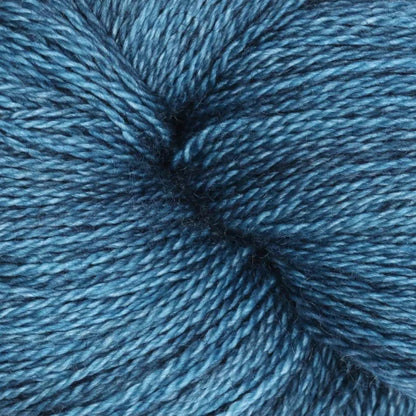 Hand-dyed cake of Symfonie Diva yarn in Sapphire Noir
