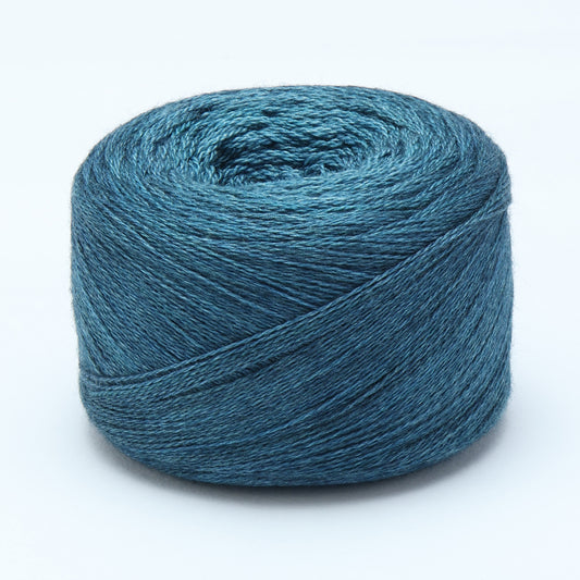 Hand-dyed cake of Symfonie Diva yarn in Sapphire Noir