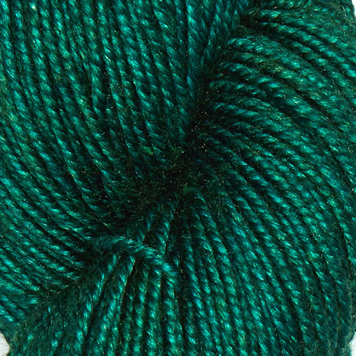 Hand-dyed skein of Symfonie Luna yarn in Emerald Green